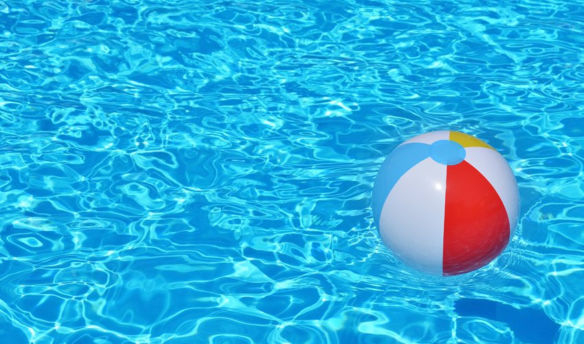 Colorful-inflatable-ball-floating-in-swimming-pool
